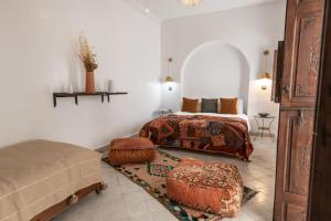 Postel nebo postele na pokoji v ubytování Riad Babouchta & Spa