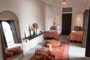Postel nebo postele na pokoji v ubytování Riad Babouchta & Spa