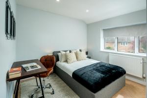 Posteľ alebo postele v izbe v ubytovaní Skyline Serviced Apartments - Flat B Rockingham Way