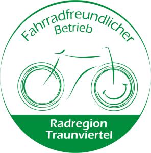 a green logo for a radiation traumatization traumatization facility at Kräuterhof Miesrigl in Losenstein +35 photos