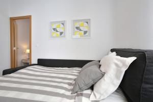 Postel nebo postele na pokoji v ubytování Apartamentos Ronda Luz