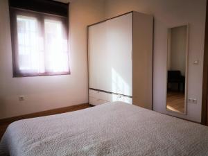 Postel nebo postele na pokoji v ubytování Apartamentos Ronda Luz