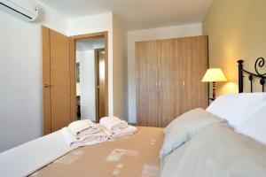 Postel nebo postele na pokoji v ubytování Apartamentos Ronda Luz