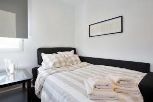 Postel nebo postele na pokoji v ubytování Apartamentos Ronda Luz