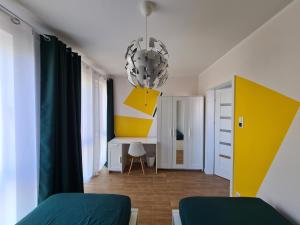 Posteľ alebo postele v izbe v ubytovaní ApartHome K8 Centrum Sulęcin