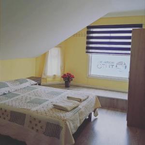 Voodi või voodid majutusasutuse Hostal Del Tuto toas
