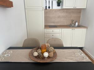 a table with a plate of food on a table at Maple Lodge in Braşov +27 photos