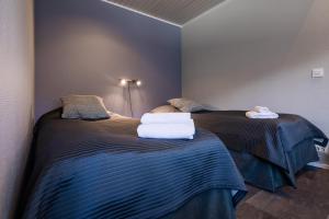 Postel nebo postele na pokoji v ubytování Kumpare apartments
