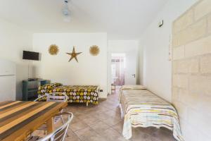 TV a/nebo společenská místnost v ubytování Bio Agriturismo Salos