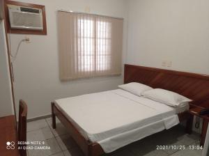 
Cama ou camas em um quarto em Hotel Mariachis
