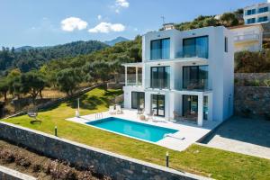 Gambar di galeri bagi Hillside Villa - Thea di Limenas