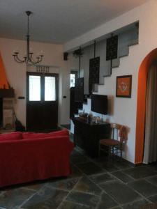 TV a/nebo společenská místnost v ubytování B&B Govinda Shanty House