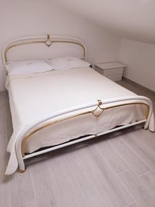 Postel nebo postele na pokoji v ubytování Cava Resort Costa d'Amalfi