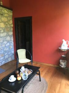 Posezení v ubytování Casa rural en Asturias a orillas del río Narcea puerta de Somiedo