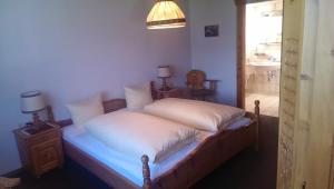 Postel nebo postele na pokoji v ubytování Pension Karolin