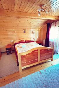 Postel nebo postele na pokoji v ubytování Cabanele FloriCrin - Cabana 2