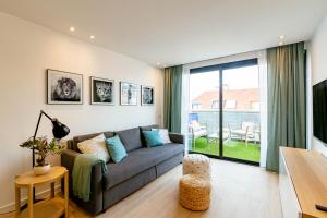 Televízia a/alebo spoločenská miestnosť v ubytovaní Luxury Penthouse With Jacuzzi La Strada