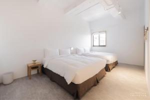 Voodi või voodid majutusasutuse 山鄰山林青年文旅 forest 3030 hostel toas