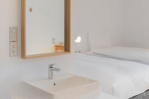 Voodi või voodid majutusasutuse 山鄰山林青年文旅 forest 3030 hostel toas