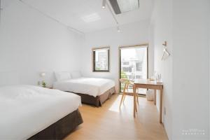 Voodi või voodid majutusasutuse 山鄰山林青年文旅 forest 3030 hostel toas