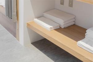 Voodi või voodid majutusasutuse 山鄰山林青年文旅 forest 3030 hostel toas