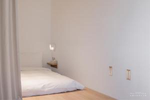Voodi või voodid majutusasutuse 山鄰山林青年文旅 forest 3030 hostel toas