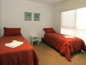 Ein Bett oder Betten in einem Zimmer der Unterkunft Aqua Luna
