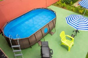 Swimmingpoolen hos eller tæt på Tico House Bed & Breakfast