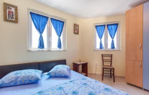Postel nebo postele na pokoji v ubytování House Marta