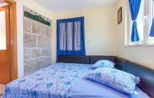 Postel nebo postele na pokoji v ubytování House Marta