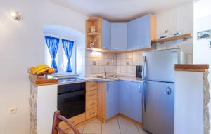 Kuchyň nebo kuchyňský kout v ubytování House Marta