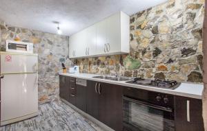 Kuchyň nebo kuchyňský kout v ubytování House Marta