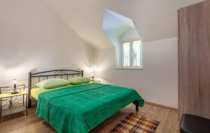 Postel nebo postele na pokoji v ubytování House Marta