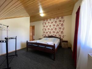 Letto o letti in una camera di Manana Japaridze's Guesthouse