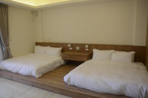 Postel nebo postele na pokoji v ubytování Rebecca Hostel