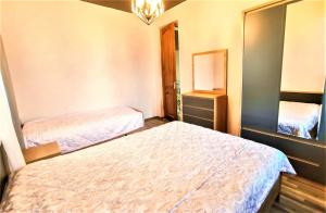 Letto o letti in una camera di Mango's Guesthouse