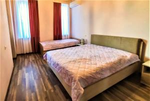 Letto o letti in una camera di Mango's Guesthouse
