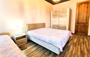 Letto o letti in una camera di Mango's Guesthouse