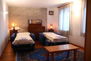 Posteľ alebo postele v izbe v ubytovaní Locanda Aurora B&B