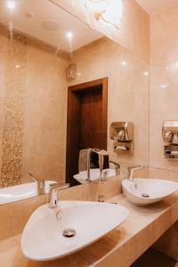 Koupelna v ubytování Hotel Bonaparte + 34 fotografií