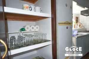 GLOCE PORT SIDE HOUSE l 砂山ビーチ近くのオーシャンビューバルコニーハウスを貸切 長期滞在向け BBQ可的厨房或小厨房