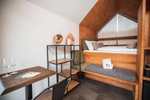 Postel nebo postele na pokoji v ubytování Nesting Resort - Homestead SONČNI RAJ
