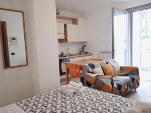 Kuchyň nebo kuchyňský kout v ubytování Conte Durini Apartments & Rooms