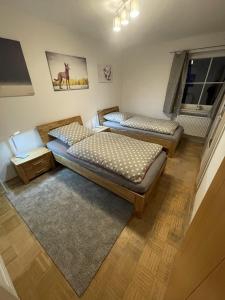 Кровать или кровати в номере Ferienwohnung Toja