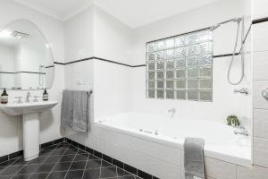 A bathroom at The Chichester Retreat