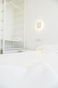 A bed or beds in a room at Duna Colorada 2