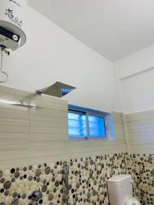 Koupelna v ubytování Hotel Nishi