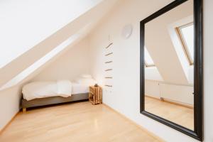 A bed or beds in a room at Landgut Riegerbauer