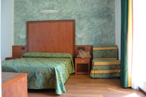Postel nebo postele na pokoji v ubytování Park Hotel Perù ***S