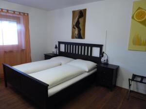 Postel nebo postele na pokoji v ubytování Apart 55